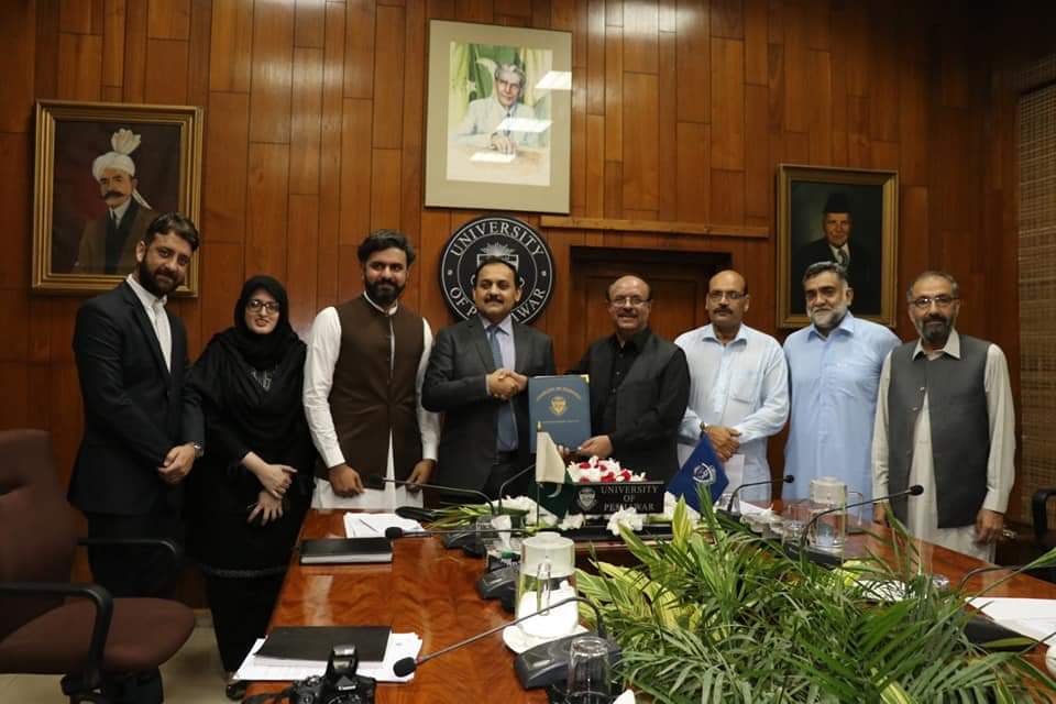 LOA signing by Dr. Saleem Janjua and faculty of Peshawar University.